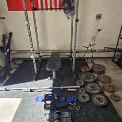 Squat Rack and Weight Plates Home Gym