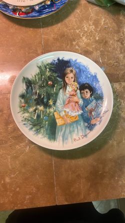 This item is a decorative porcelain collector plate titled "Cecile et Raoul," featuring artwork by Paul Durand