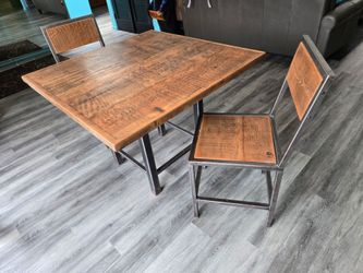 Table and chairs by Urban reclamations