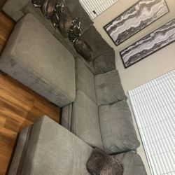 Spacious Gray Sectional Sofa + Oversized Ottoman – Clean & Comfortable 