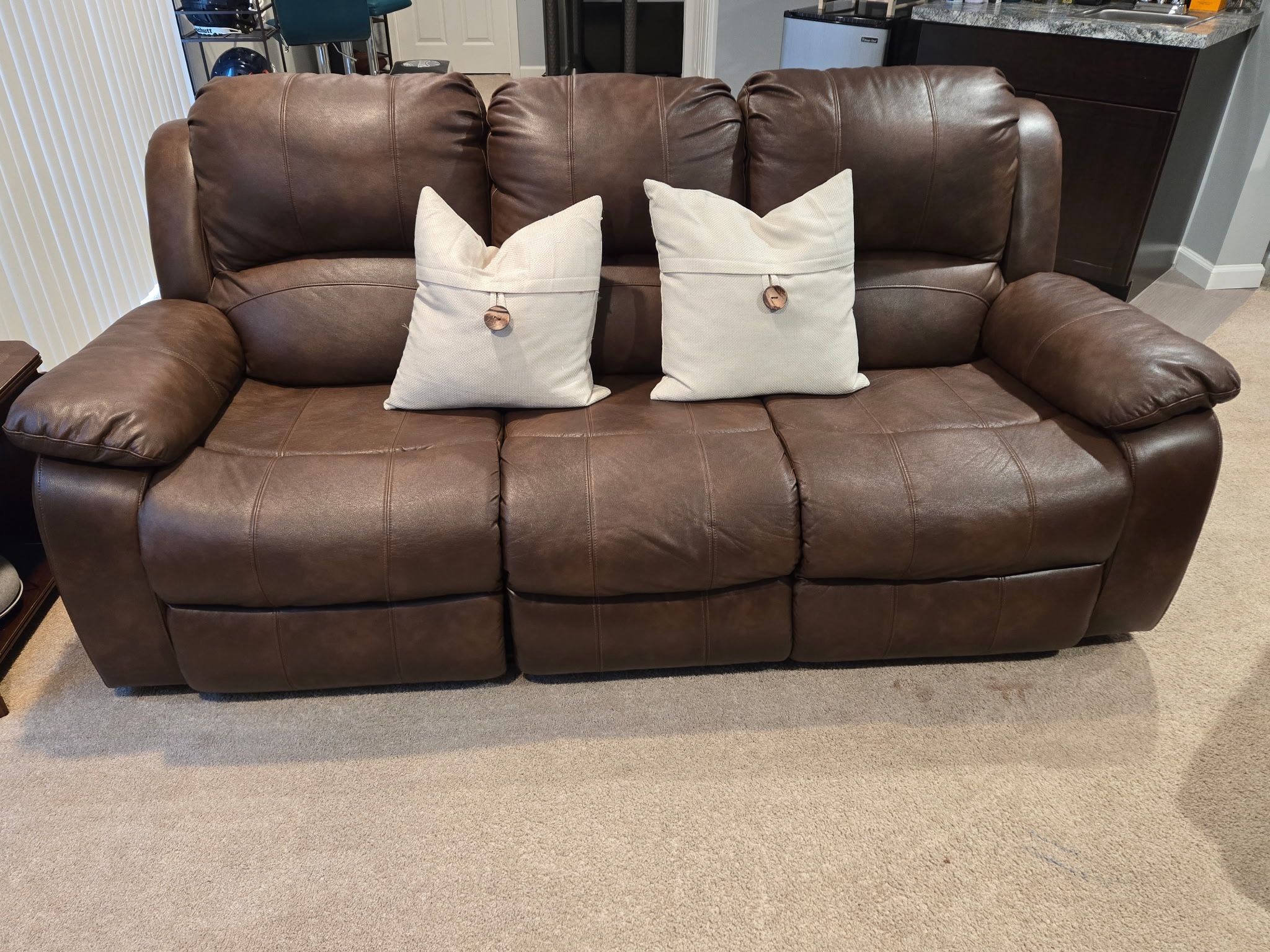 Brown couch and chair