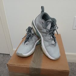 This is a pair of Nike Jordan Stay Loyal 3 shoes in a wolf grey and white colorway. 