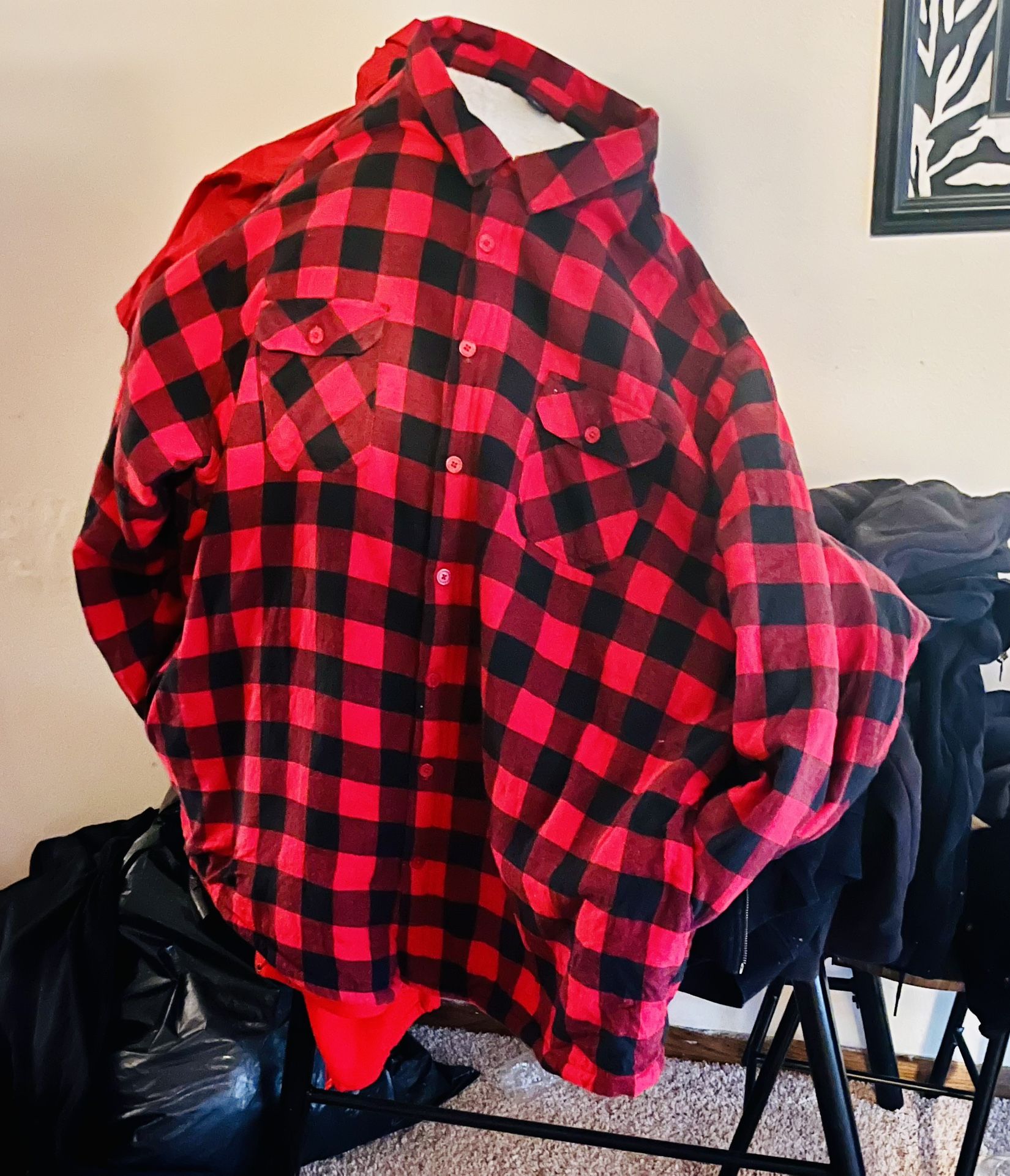 Red and black lumberjack flannel jacket pocket