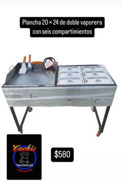 Plancha taquera con seis charolas para mantener la comida caliente