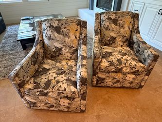 Matching swivel chairs.