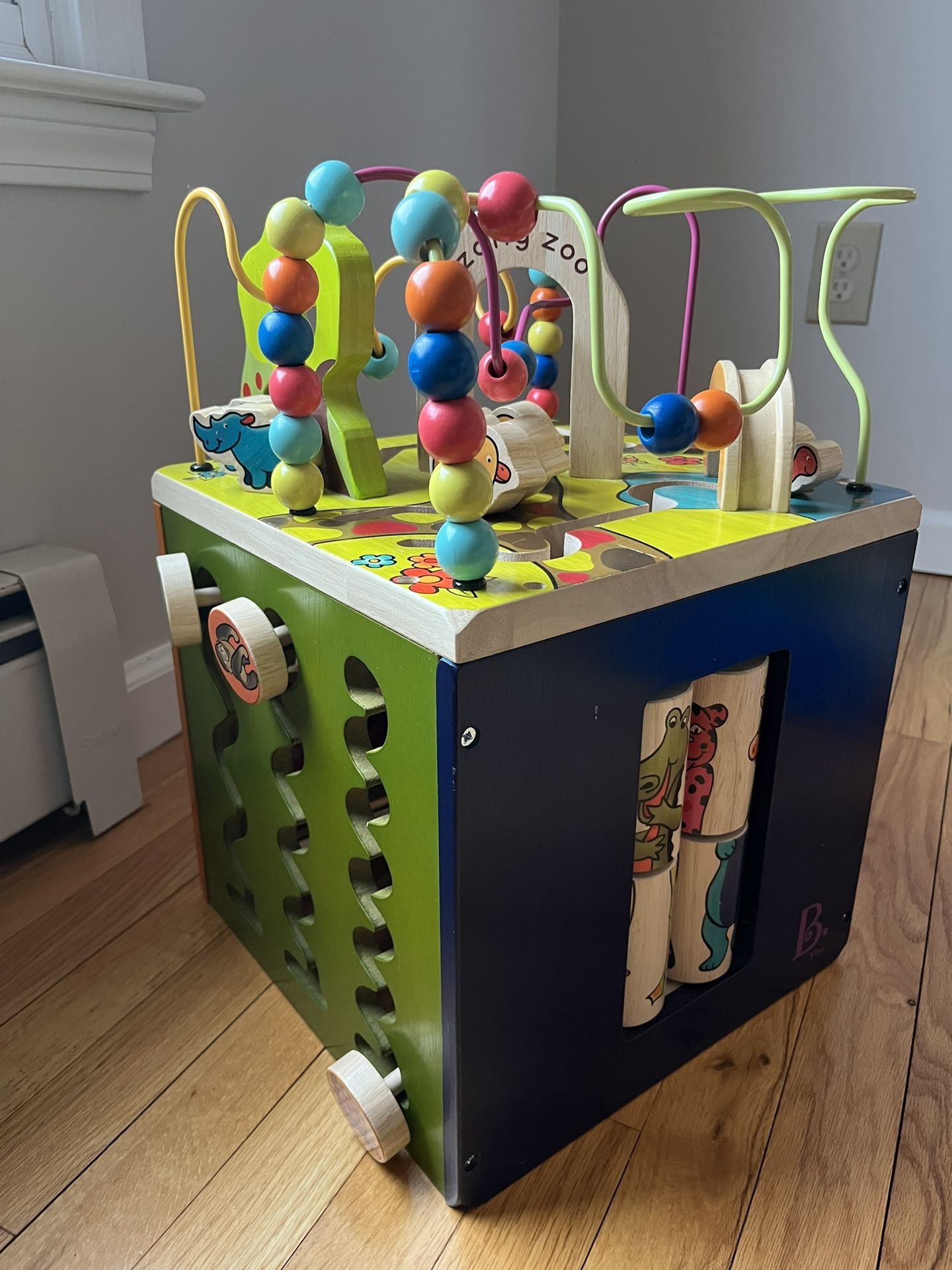 B. Toys Wooden Activity Cube - Zane’s zoo