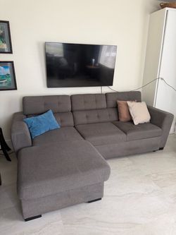 Grey Sofa with Pull out Bed and Storage