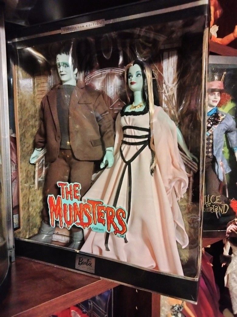 Barbies The Munsters $300 Johnny Depp 150 The Colossian $200 Ellie Mae 300 Goldie Hawn 100 Silk Tone Barbies Are 200 Each The Bride IS 250