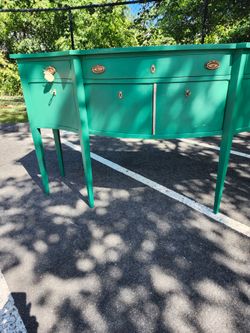 Sideboard has small scratches on top but otherwise it's in good shape