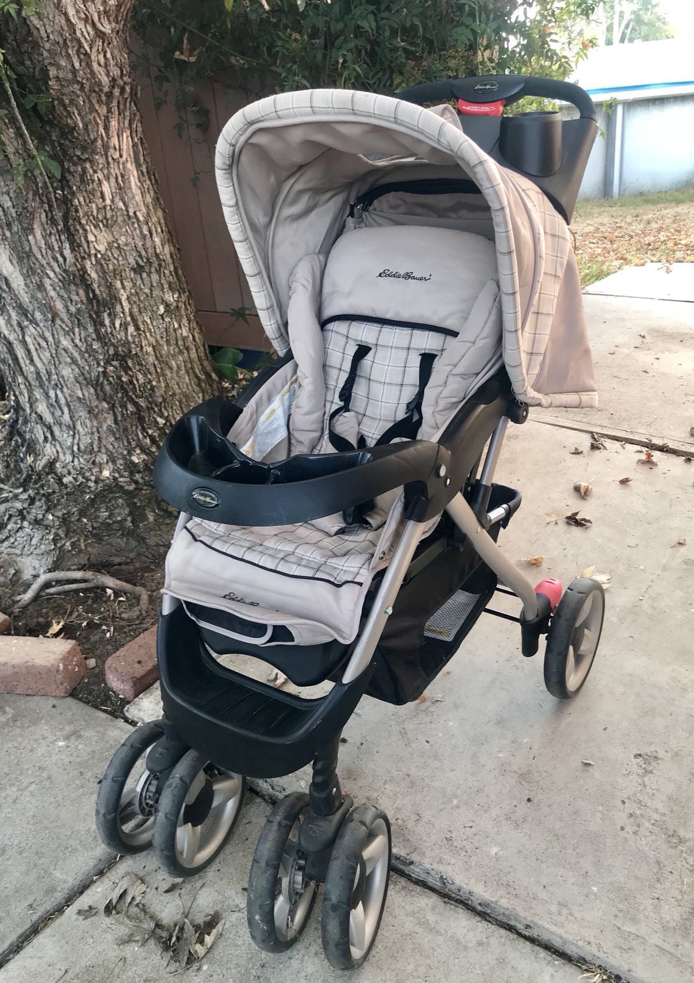 Stroller - Eddie Bauer, cup holder, Phone compartment/ storage space, easy collapsible, top viewer, bottom storage, back storage, folds up with one b