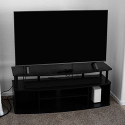 4K 50 inch TV, Sound Bar, and Entertainment Center