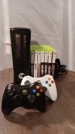 Xbox 360 Slim + Controllers + Games