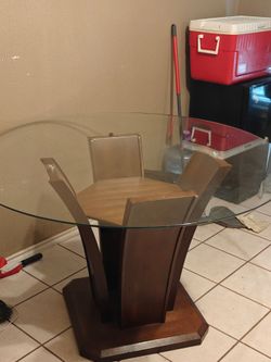 Glass top wooden dining table