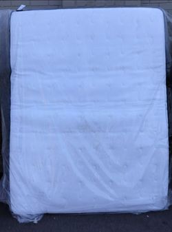 Queen sized mattress and foldable queen size bed frame