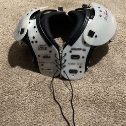 Football Shoulder Pads And Riddell Helmet