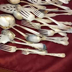 Silver spoons and forks 