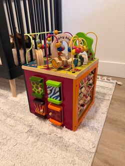 B. toys Wooden Activity Cube