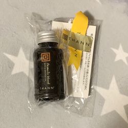 New In Original Package-THANN Aromatic Wood Bath And Massage Oil.