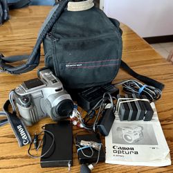 Canon Optus MiniDV Camcorder With Batteries, Charger, Wireless Microphone And Case