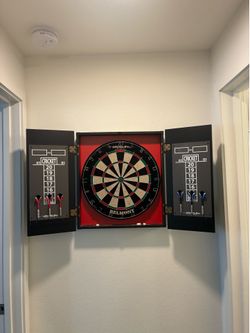 Dart board used but in good condition. Best offer or $60