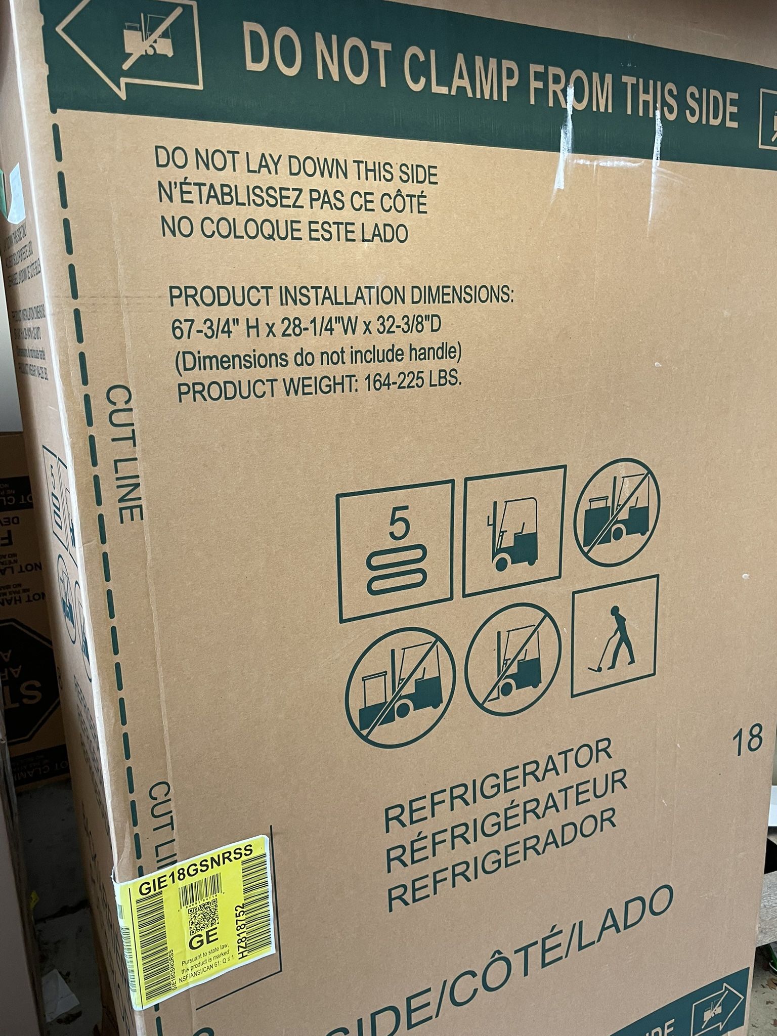 GE Stainless Steel Fridge With Black Sides