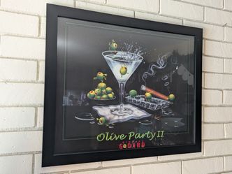 Michael Godard Olive Party II Framed Print
