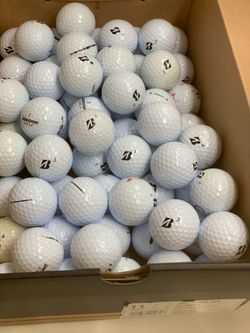65 golf balls Bridgestone in good condition
