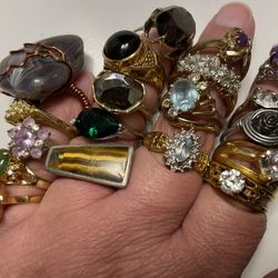 assorted silver stone rings