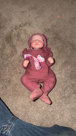 Realistic, baby doll comes with Passy