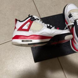 Jordan 4 retro white good condition size 6y paint chipped on left shoe