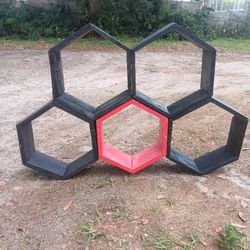 Shelf With Hexagon Shaped Slots 