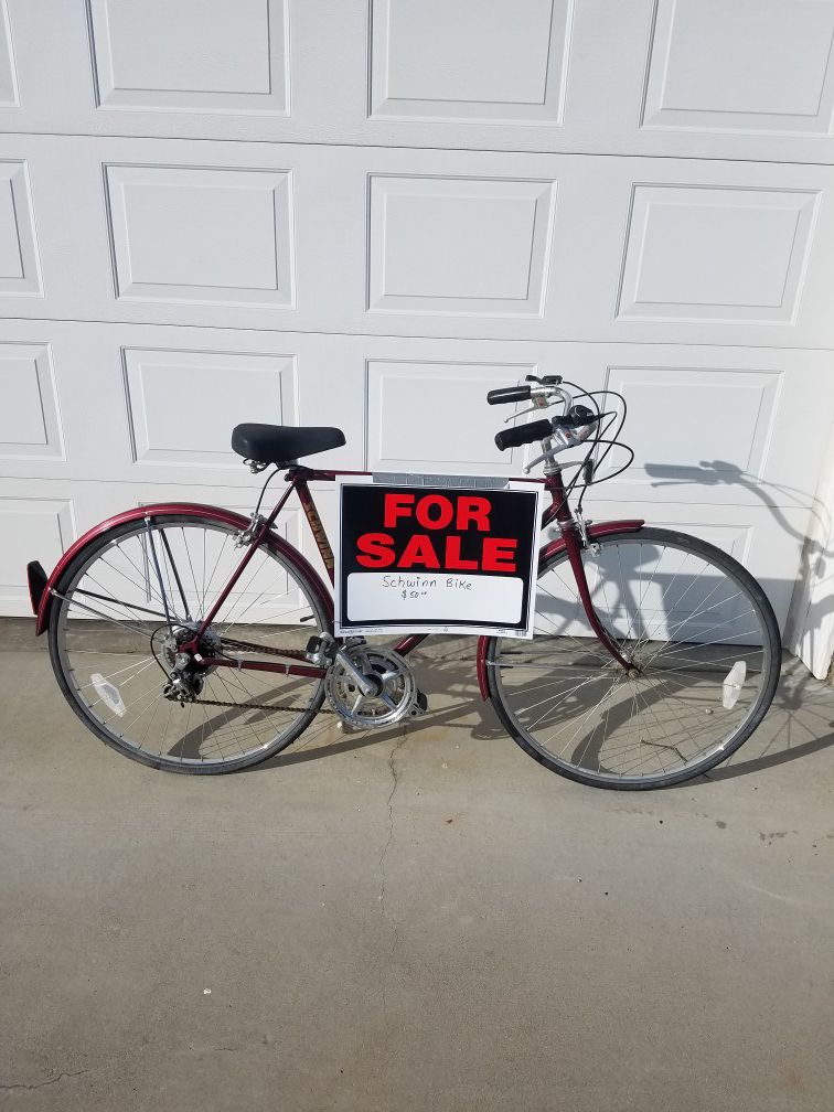 27 inch Schwinn men's bicycle, new tires & tubes,original seat , & paint , bike has been cared for , $75..