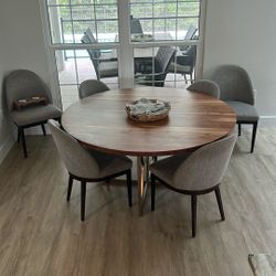 Crate and barrel round table with six chairs