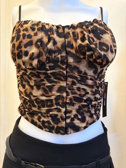 Cheetah top size small new w tag $10
