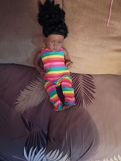 Realistic baby doll