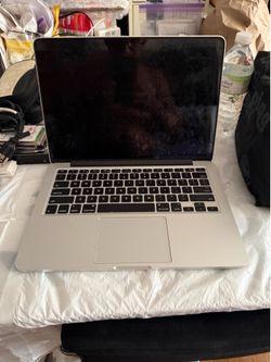 Apple MacBook Pro ( Retina 13 inch Early 2015 ) 2.7 GHz Dual Core Intel Core I5 8 GB Ram & 256 GB HD