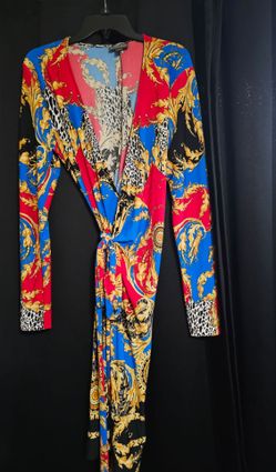 Bold elements wrap around dress