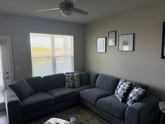 Sectional couch with pillows