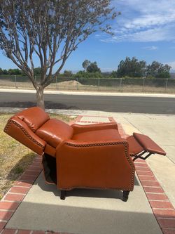 Medieval-style modern leather recliner