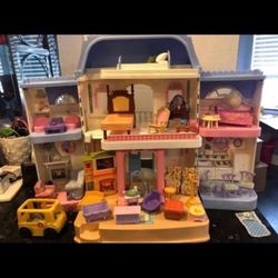 Vintage Fisher-Price dollhouse with furniture