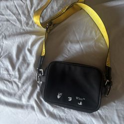 Off-White black nylon crossbody bag with an industrial strap. 

