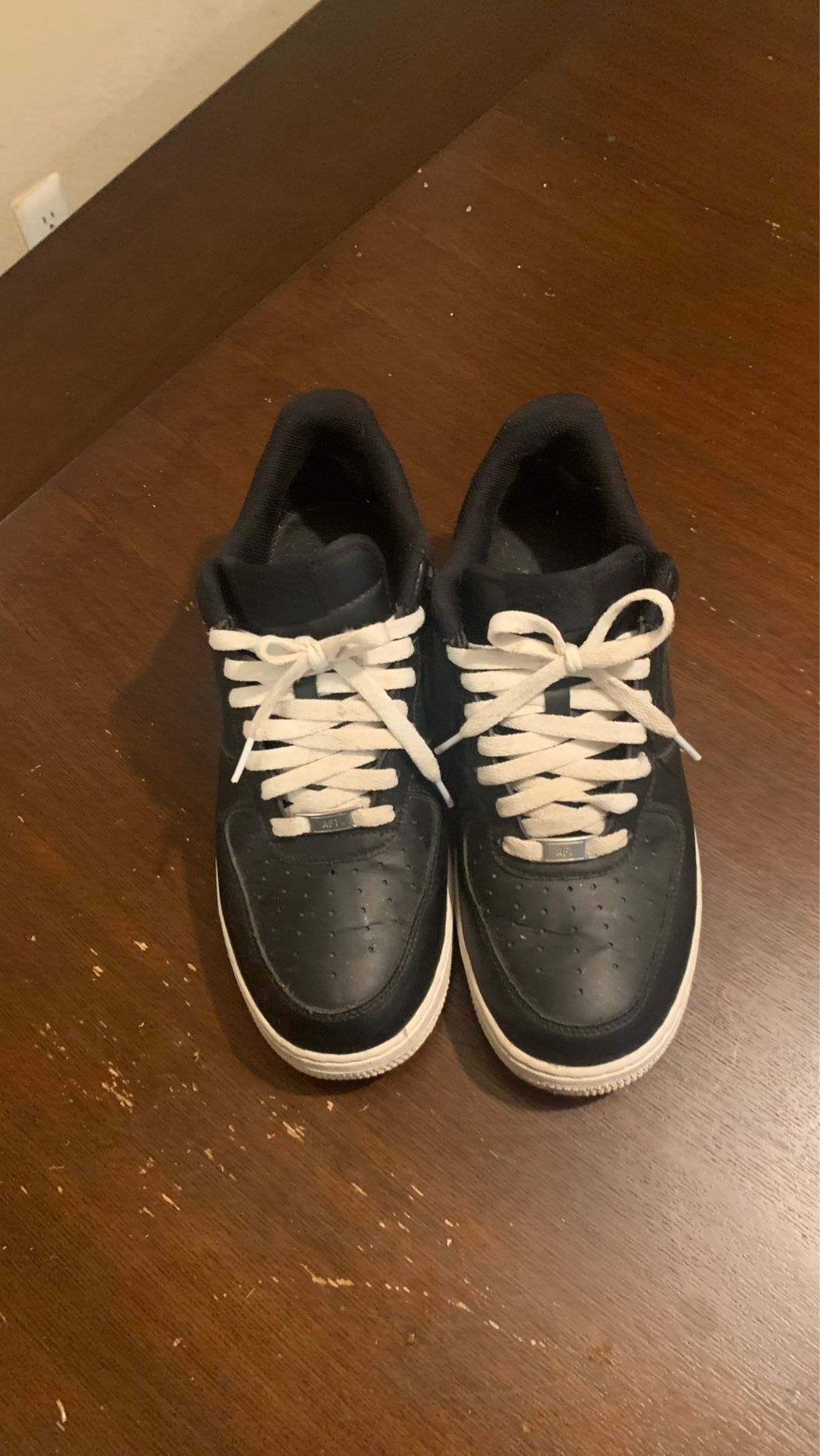 White and black airforce ones