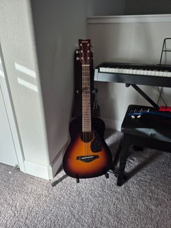 3/4 acustic guitar