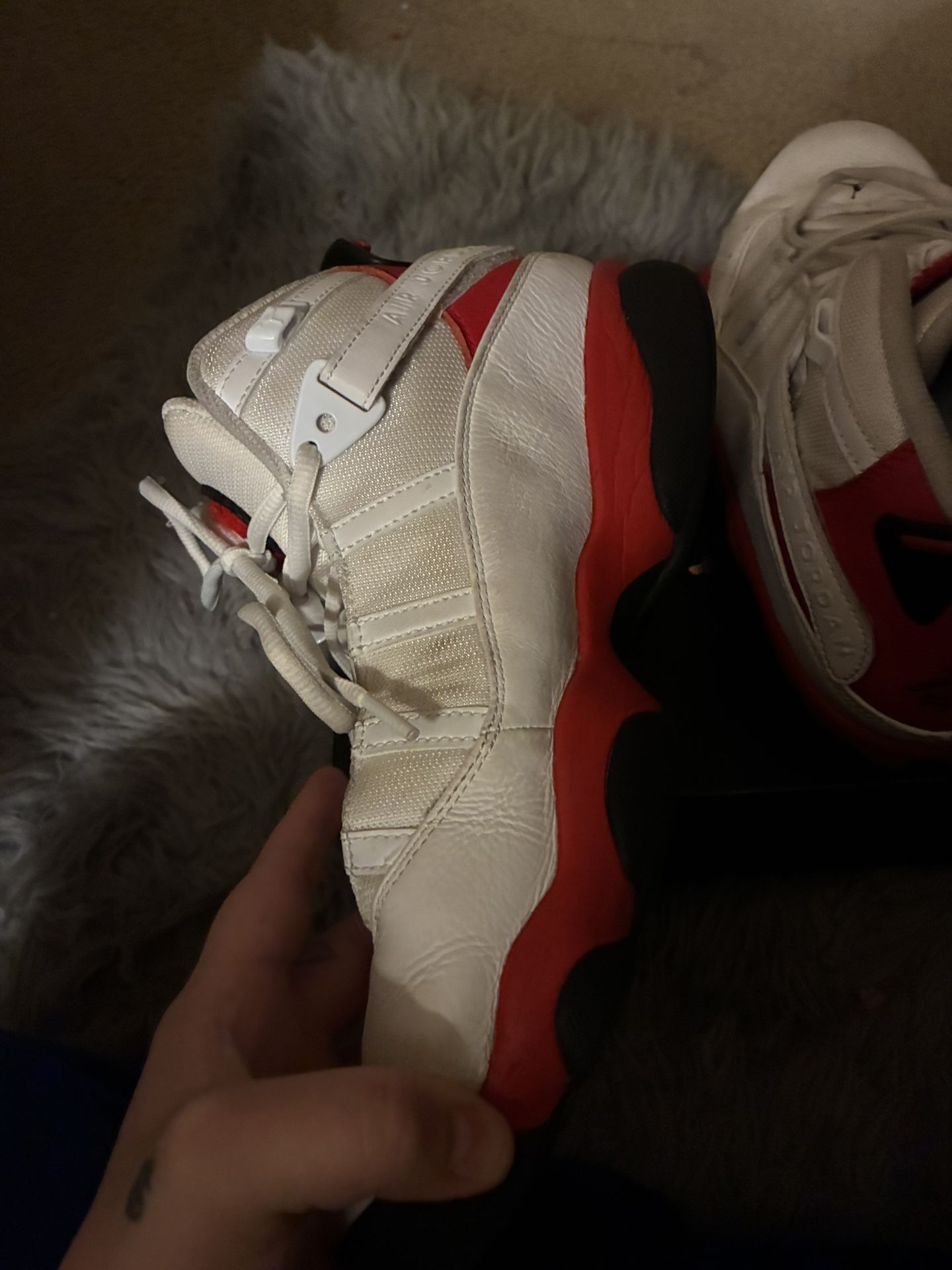 white, black, and red Air Jordan 6 Rings sneakers