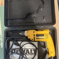 Dewalt D21008 Drill with manual and carrying case