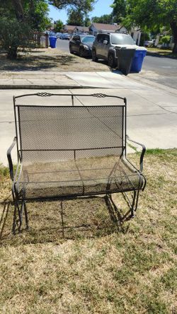 Selling metal Glider chair ,rocks back and forth