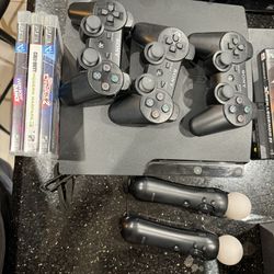 PS3 With Controllers And Games Move 