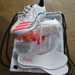 F50 Messi Elite Firm Triunfo Dorado