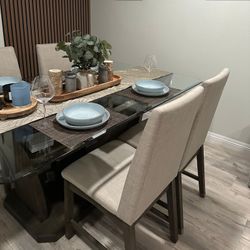 Dinning Table  with 4 chairs.