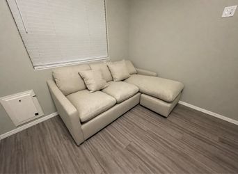 Living Spaces Cream Sectional Sofa w/ Chaise